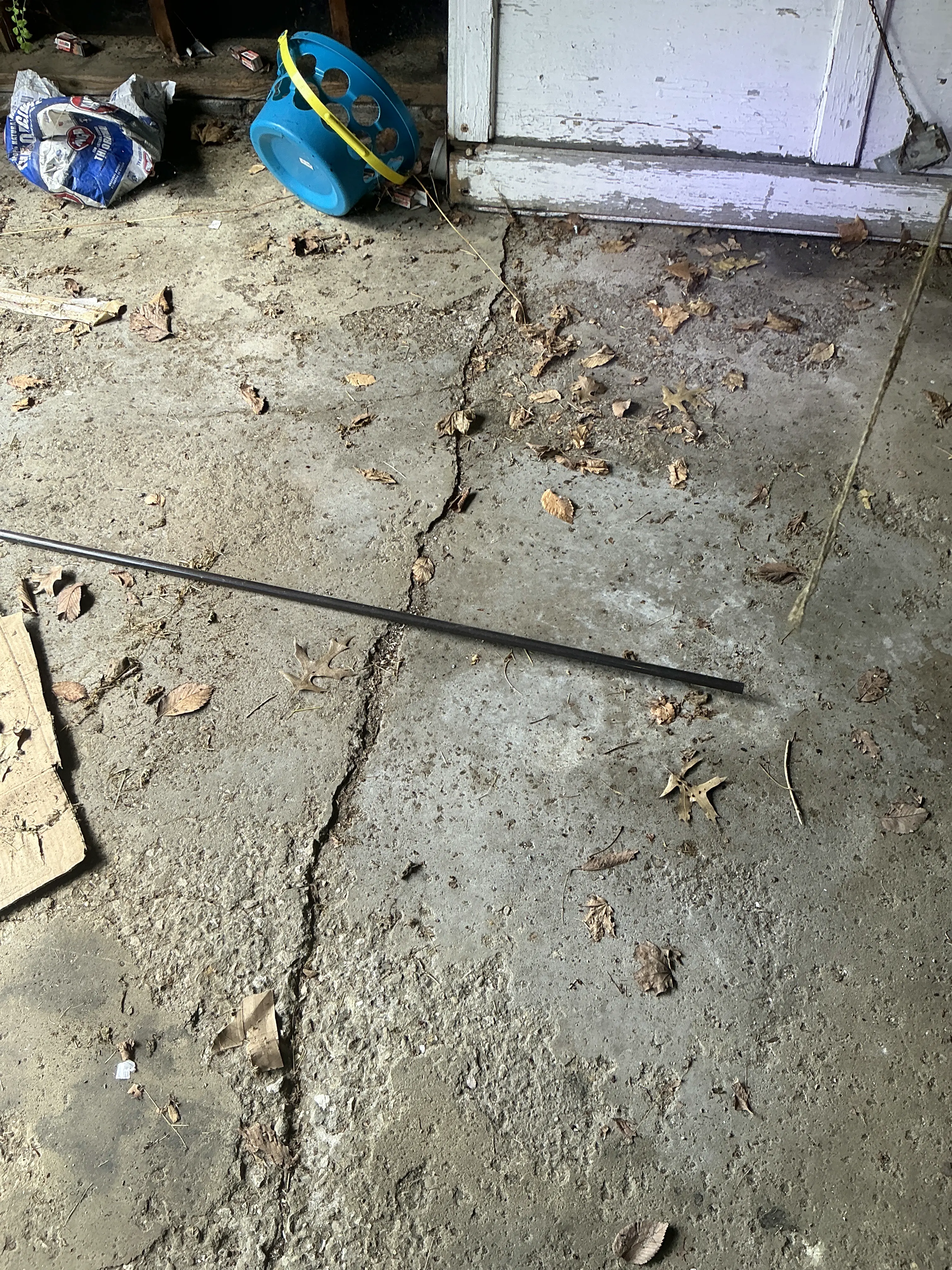 Large crack in concrete garage floor slab 2026-08-05