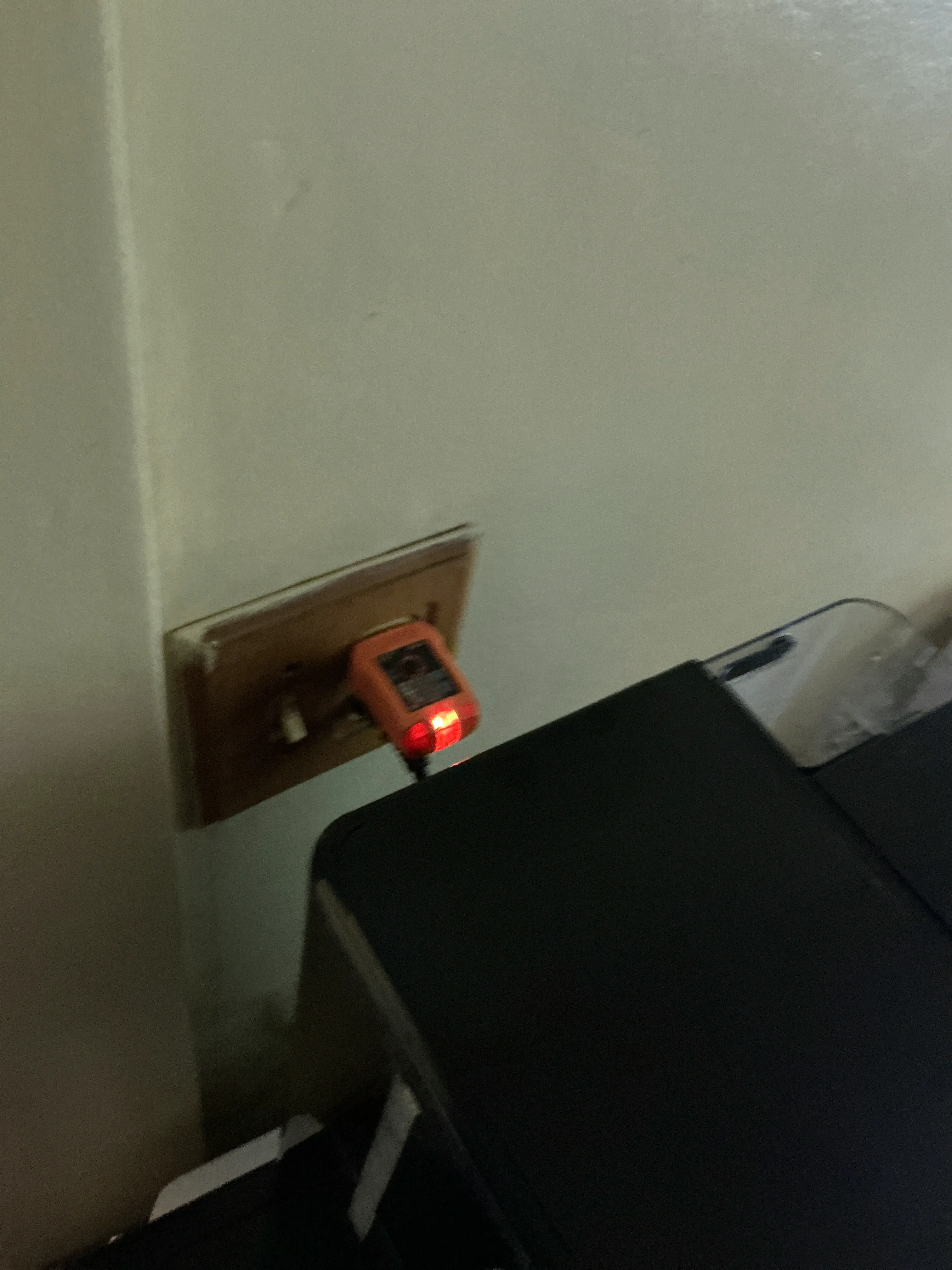 Electrical circuit tester plugged into a wall outlet during a home inspection 2026-08-22