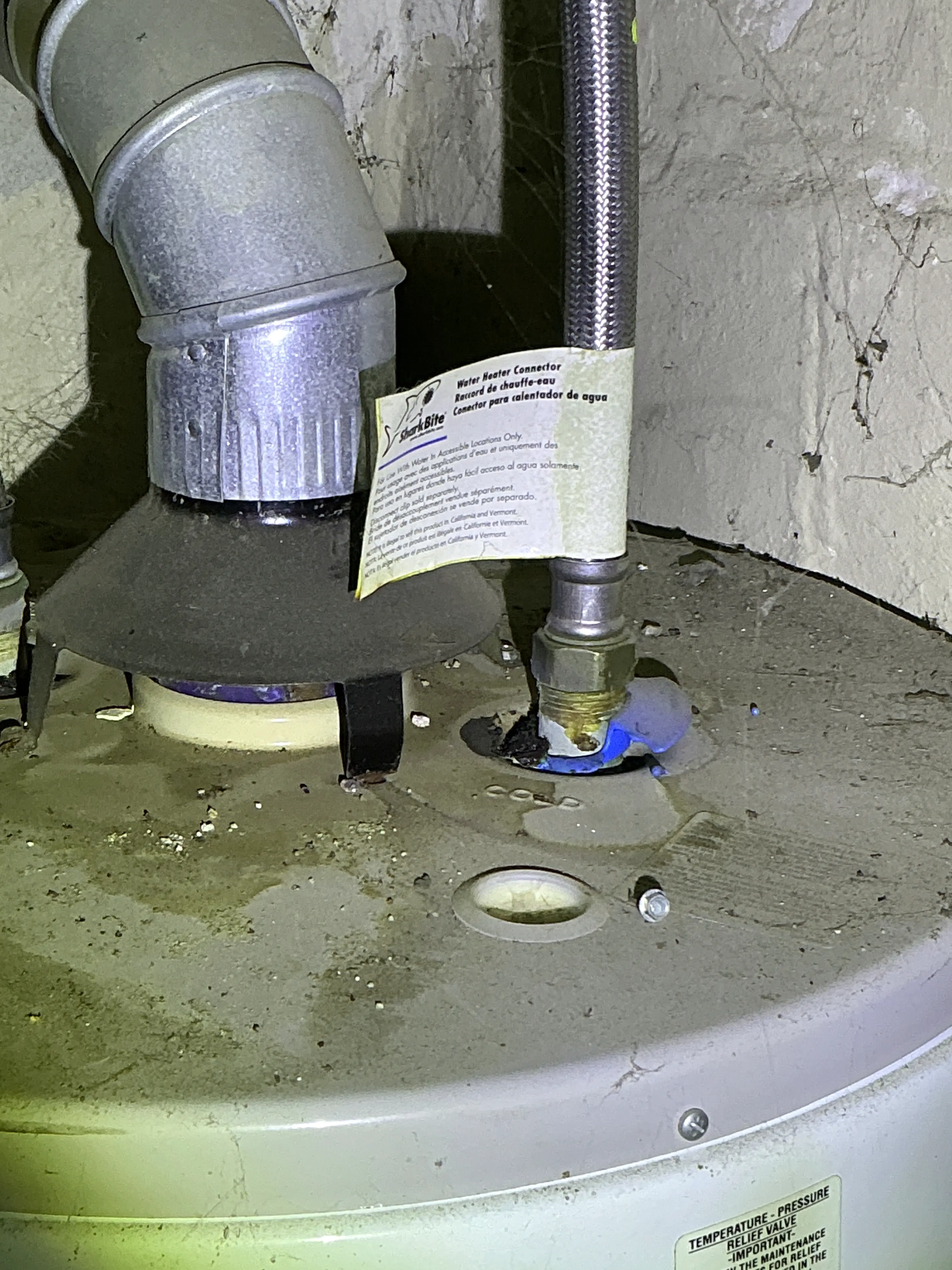 Corrosion and leakage signs on a water heater pipe connection 2026-07-24