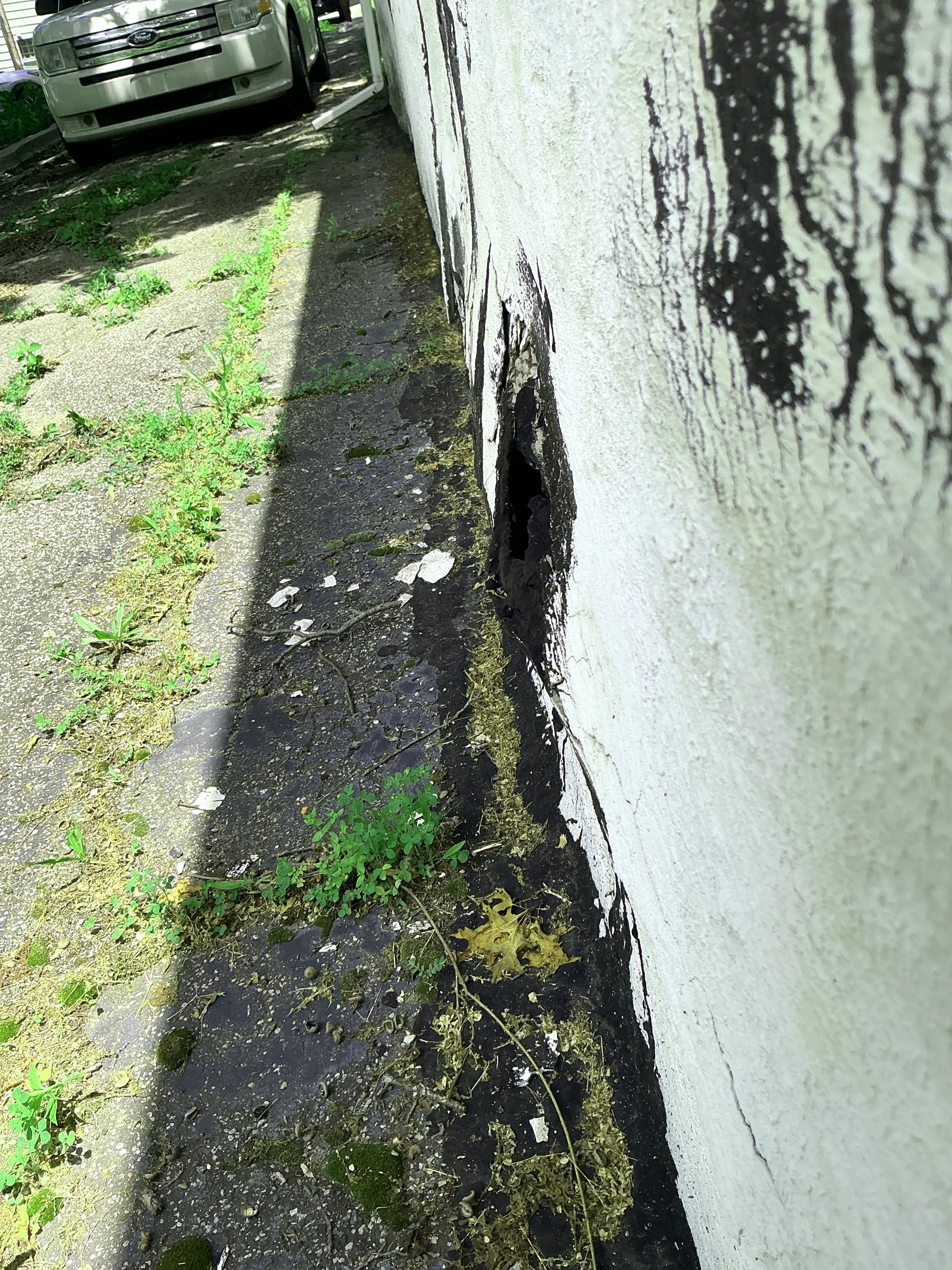 Hole at the base of exterior wall and foundation during home inspection 2026-08-13