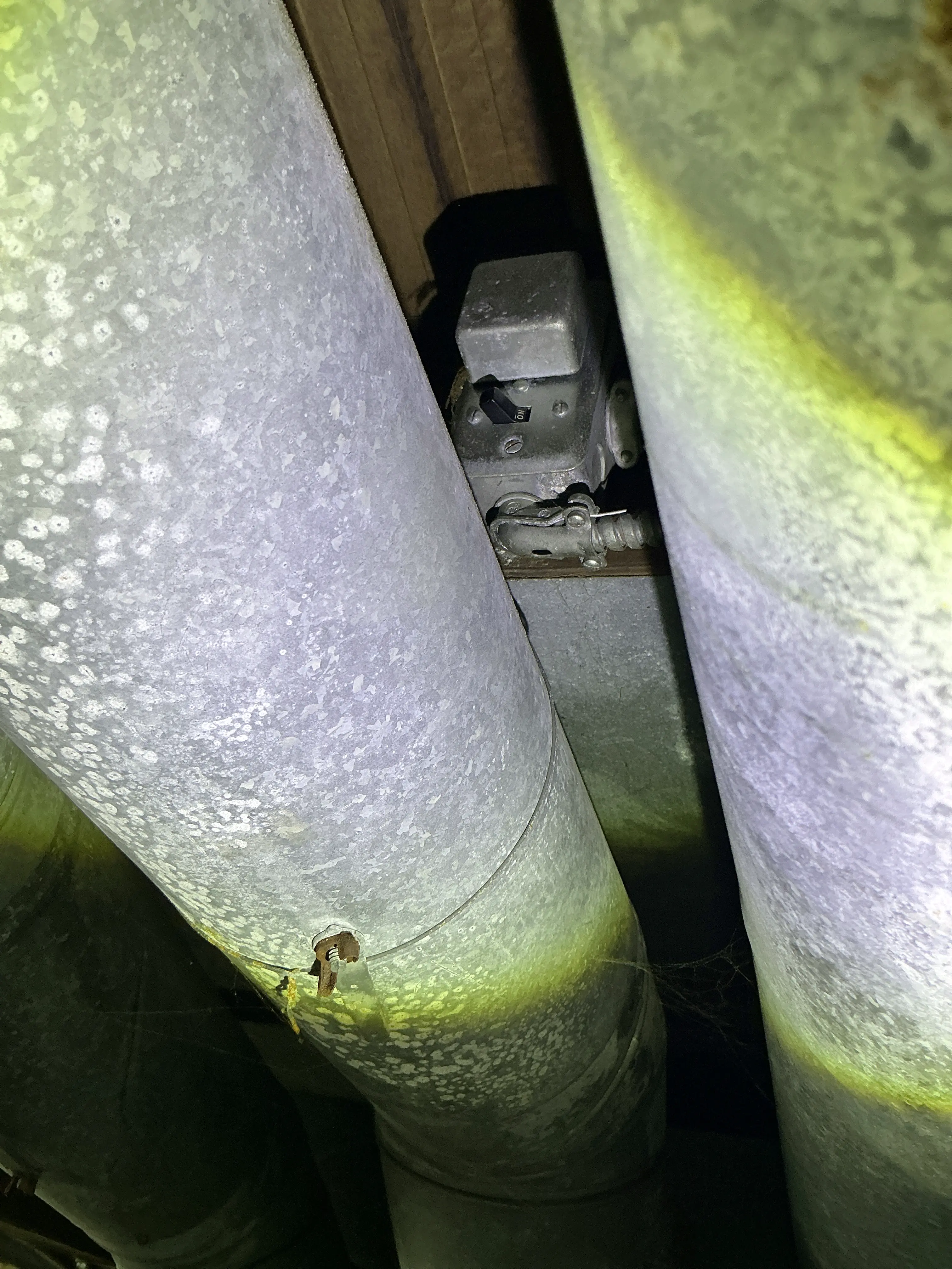 Electrical switch box obstructed by galvanized HVAC ductwork 2026-08-01