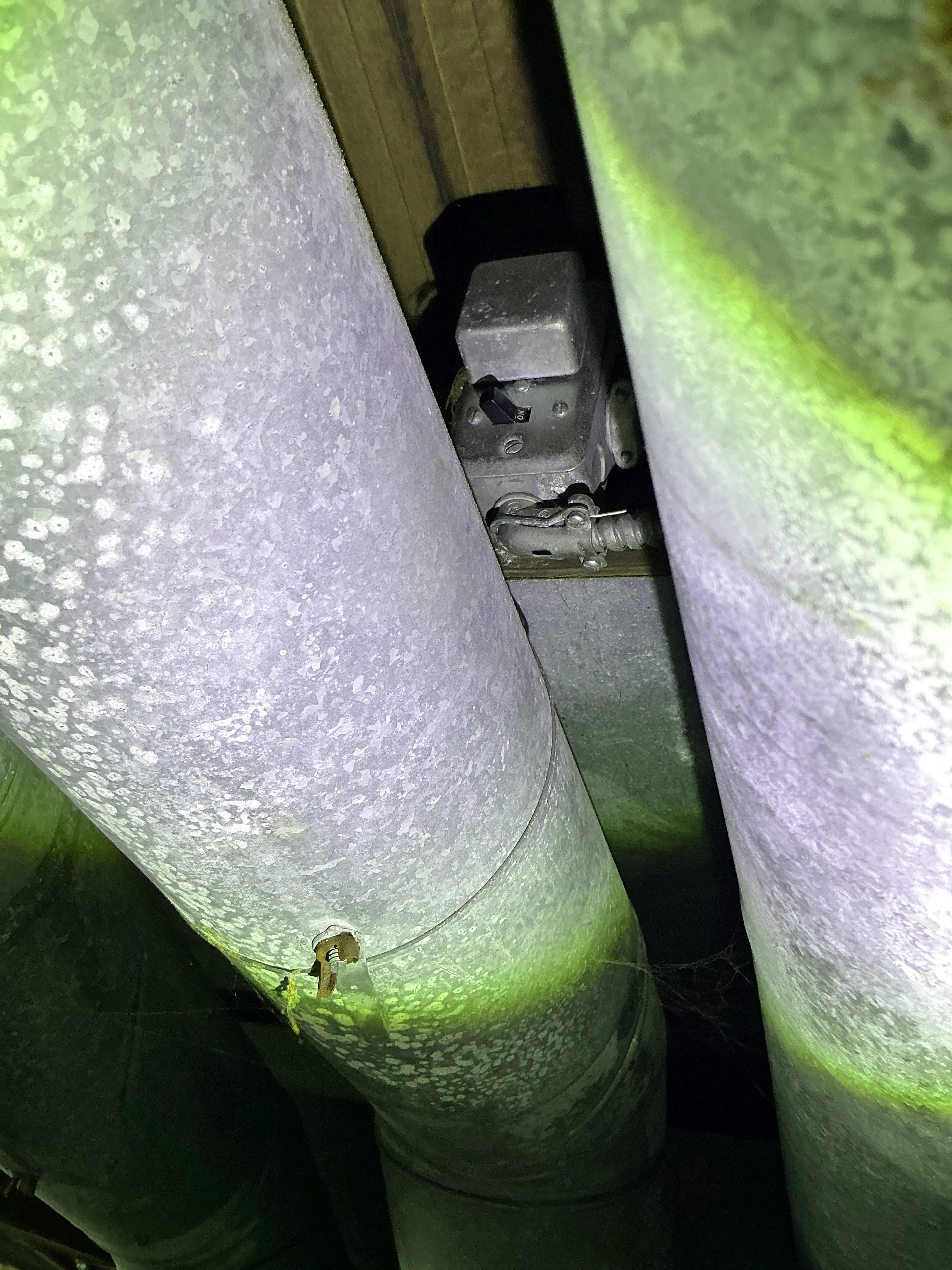 Electrical switch box obstructed by galvanized HVAC ductwork 2026-08-14
