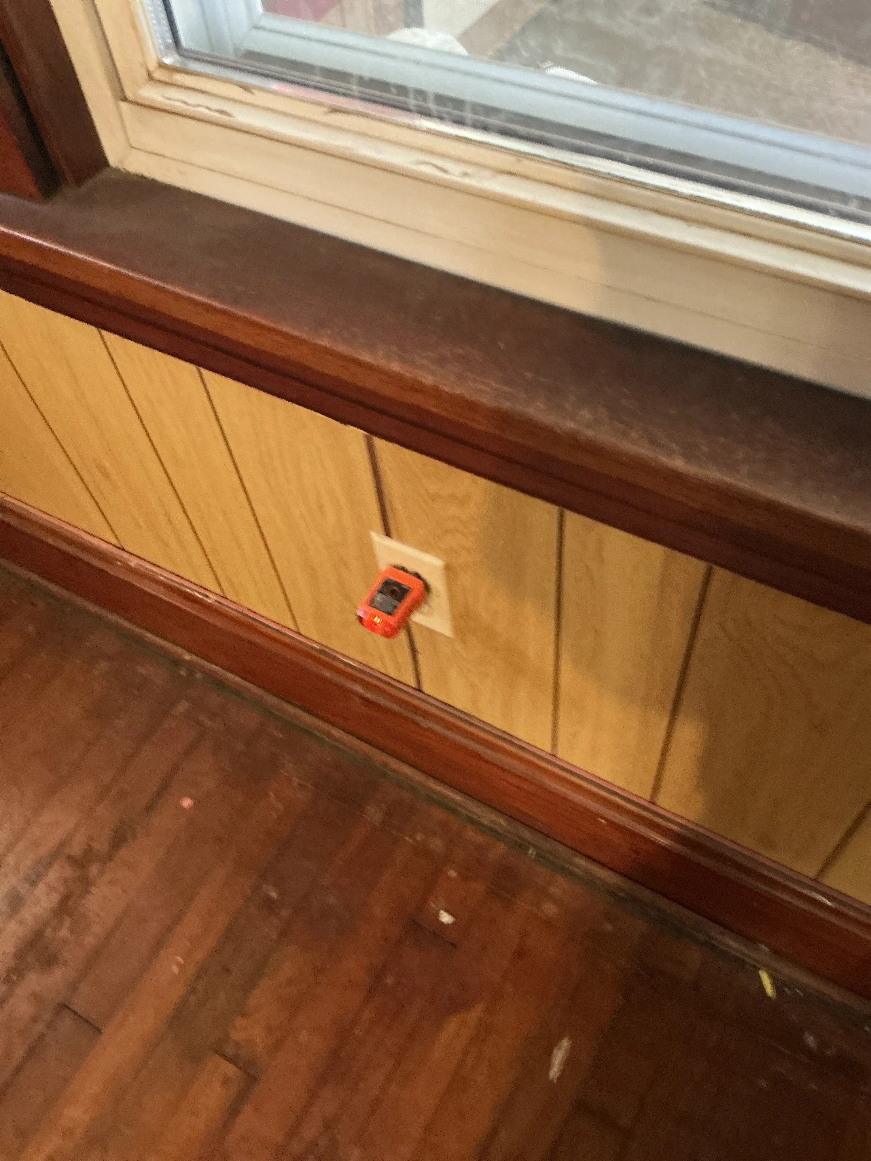 Electrical receptacle tester plugged into a wall outlet 2026-07-07