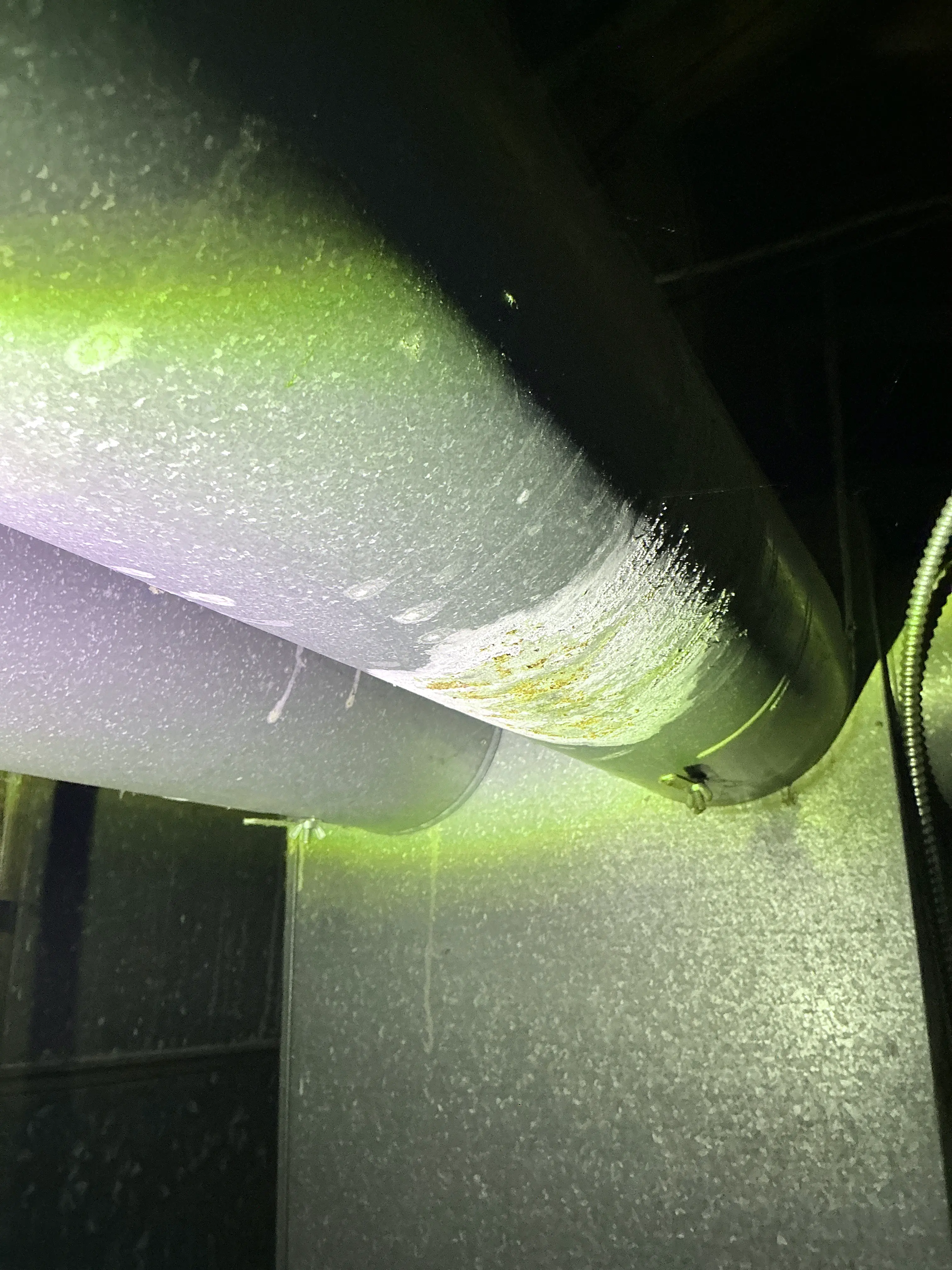 Rusted metal flue pipe and galvanized ductwork inspected during lead test 2026-08-17