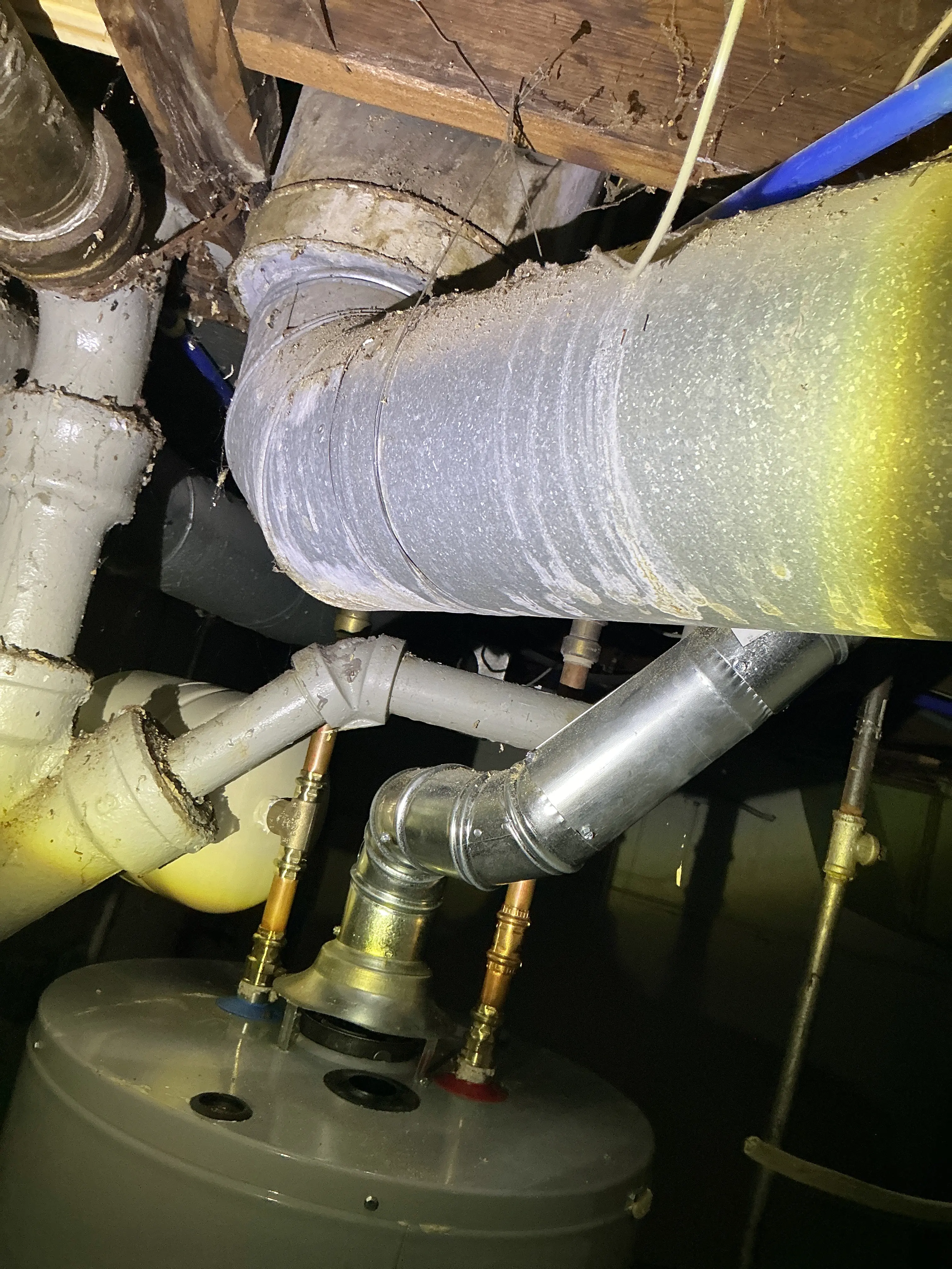 Water heater metal flue pipe and plumbing lines during a lead test 2026-08-01
