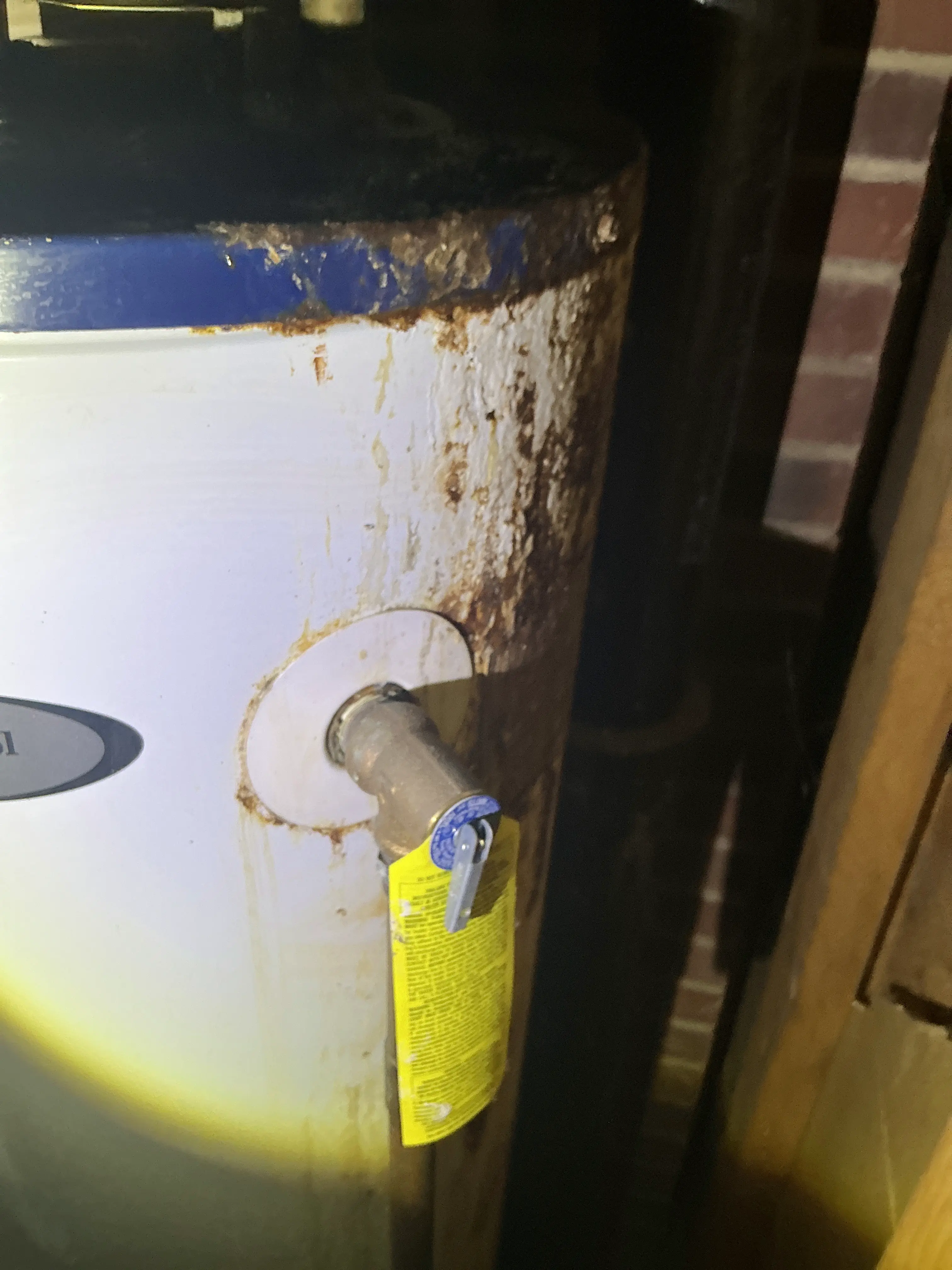 Rust and corrosion near temperature and pressure relief valve on water heater 2026-08-06