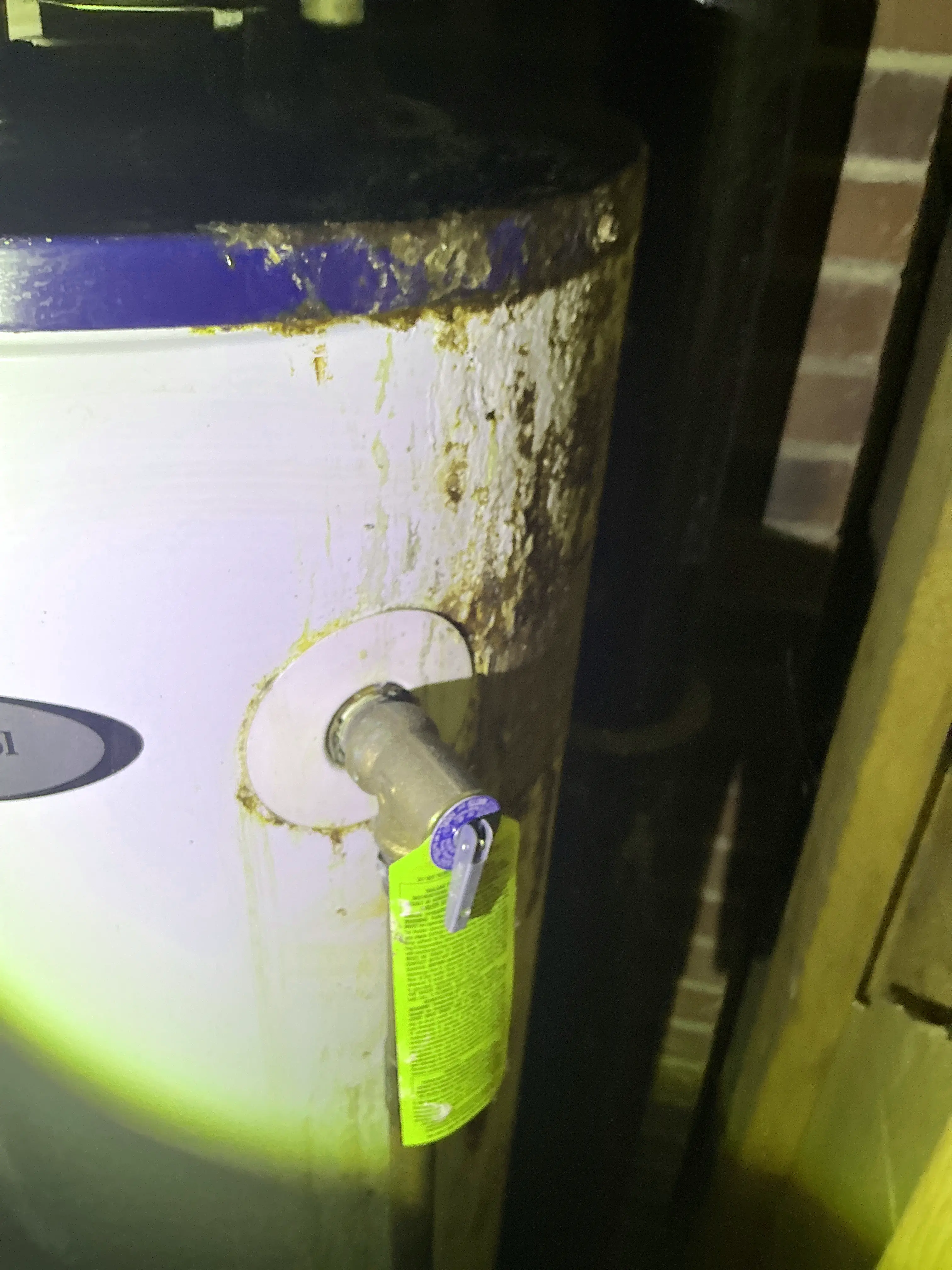 Rust and corrosion near temperature and pressure relief valve on water heater 2026-08-16