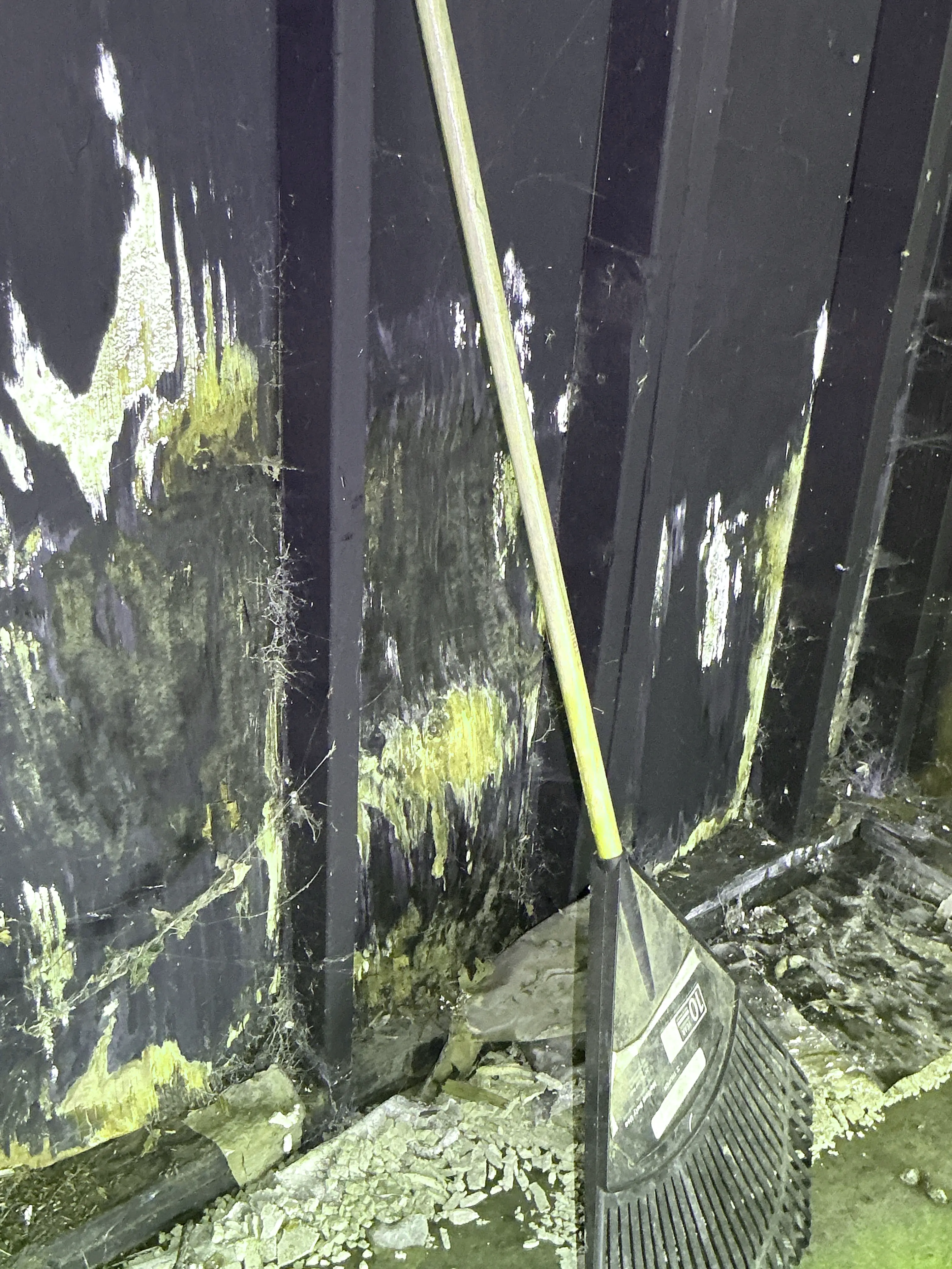 Severe wood rot and water damage on subflooring near foundation during home inspection. 2026-08-04