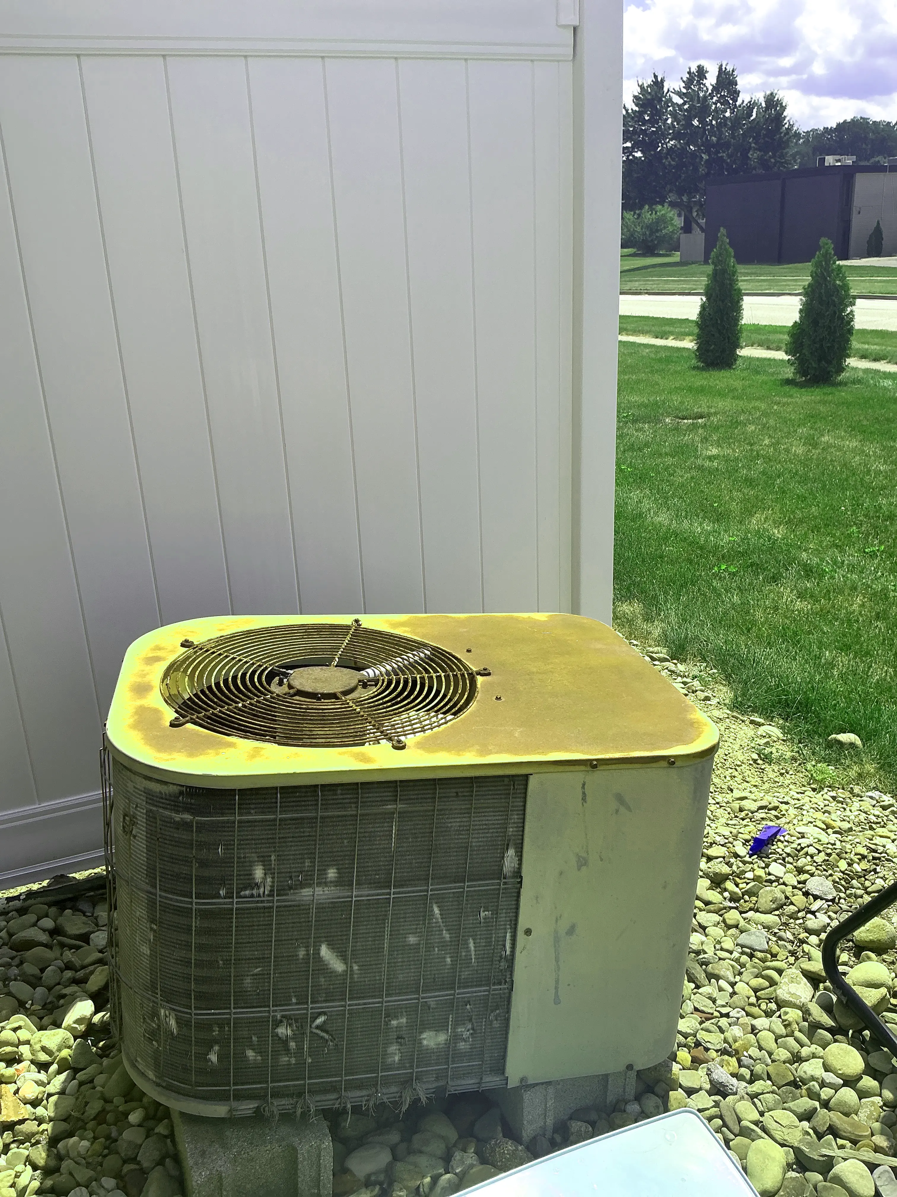 Rusted outdoor air conditioner unit showing severe corrosion during home inspection 2026-07-07