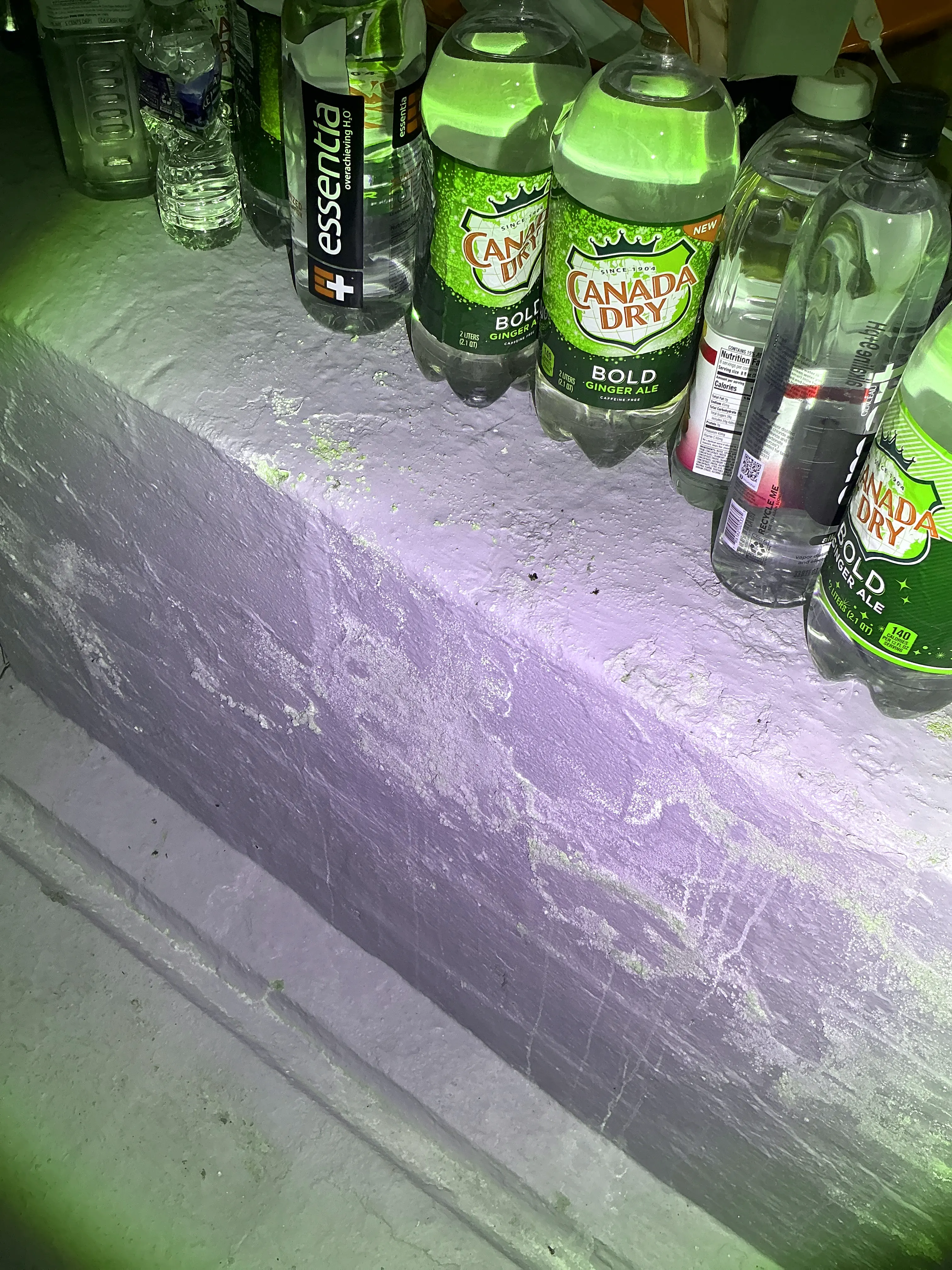 Efflorescence and flaking paint on basement masonry wall from moisture penetration 2026-08-11