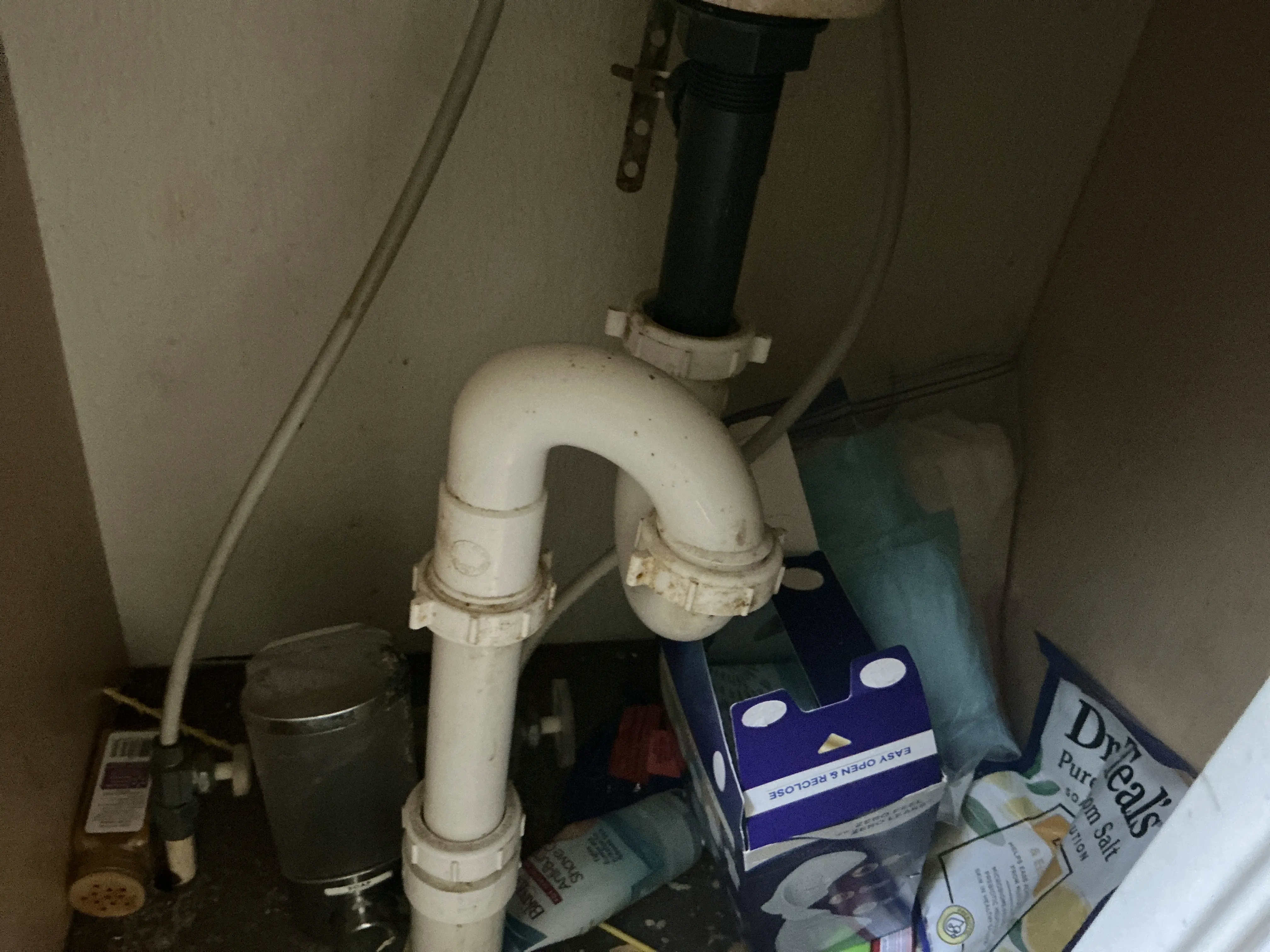 Improper S-trap plumbing configuration underneath a sink 2026-07-16