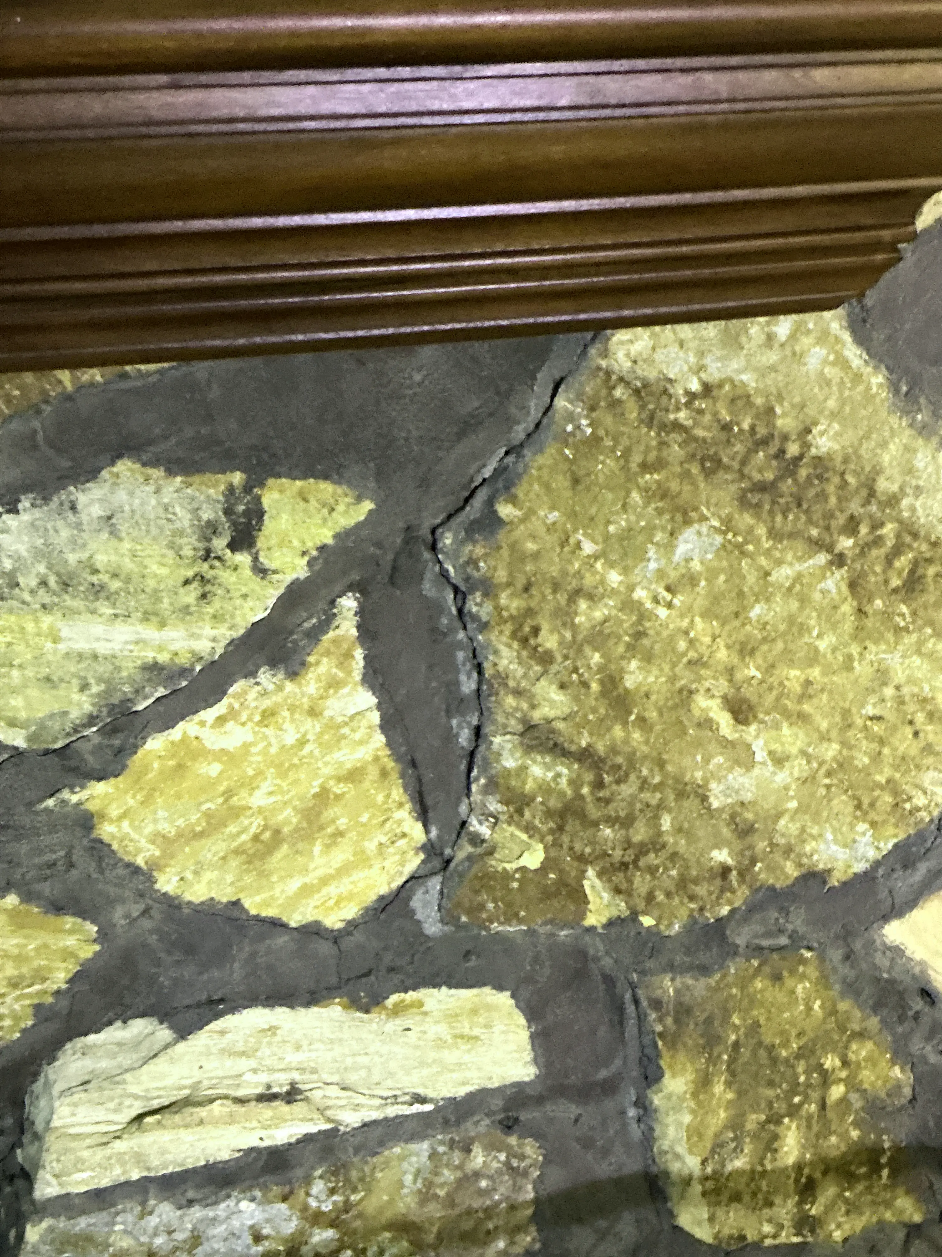 Cracked mortar in stone veneer wall found during home inspection 2026-08-22