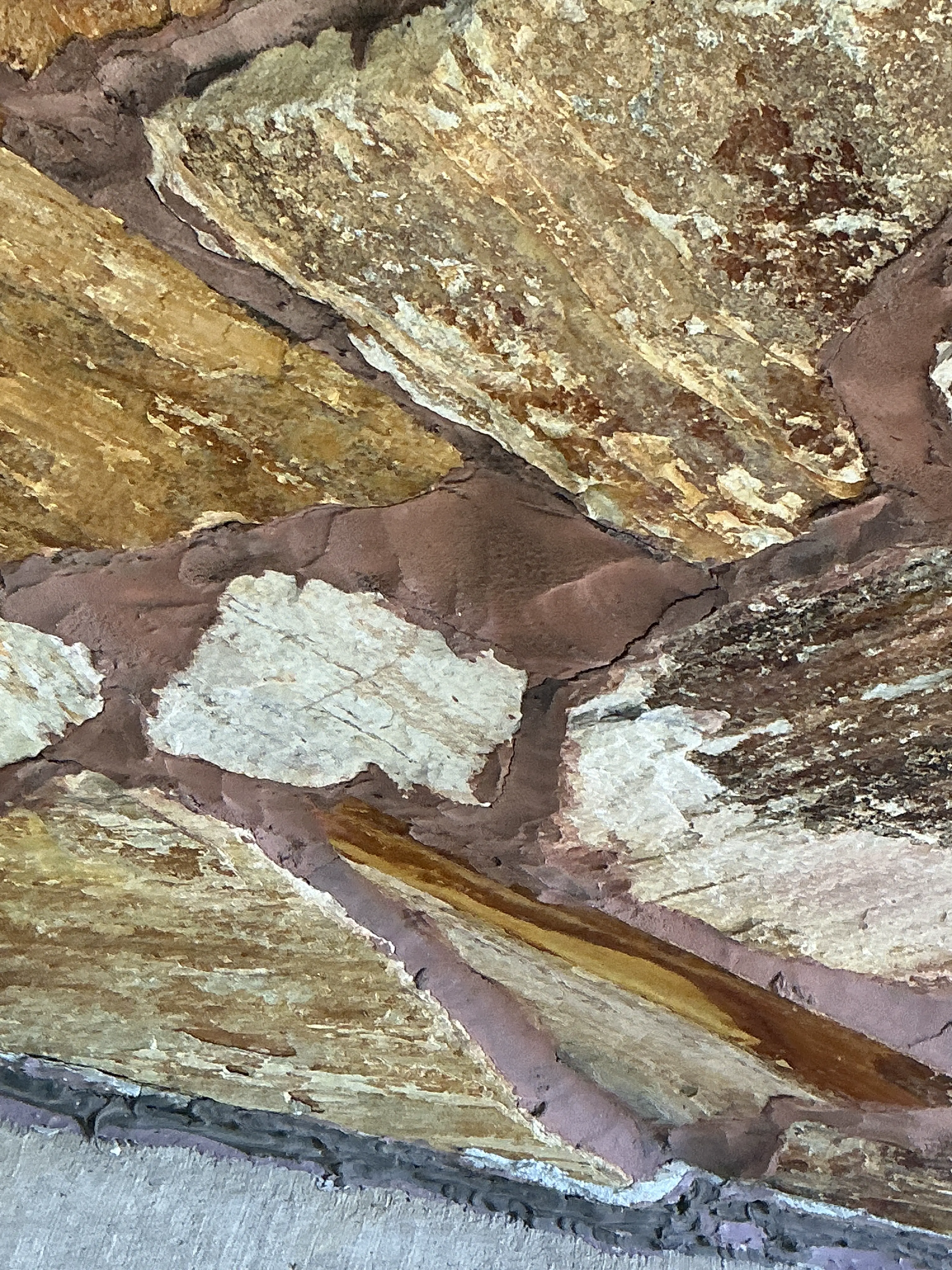 Cracked mortar joints on stone veneer wall 2026-08-15