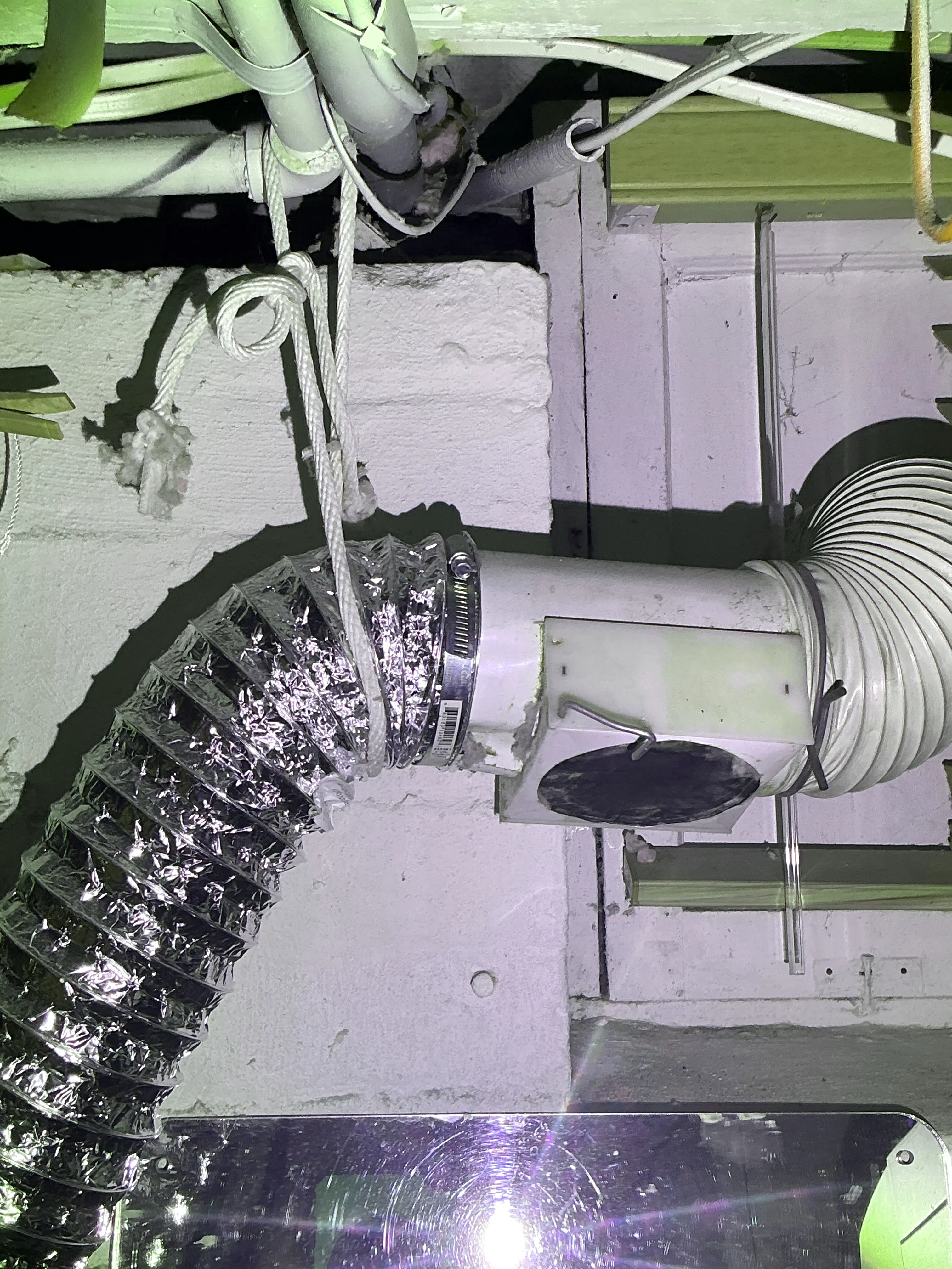 Improper flexible dryer vent hose and rope support in home inspection 2026-07-15
