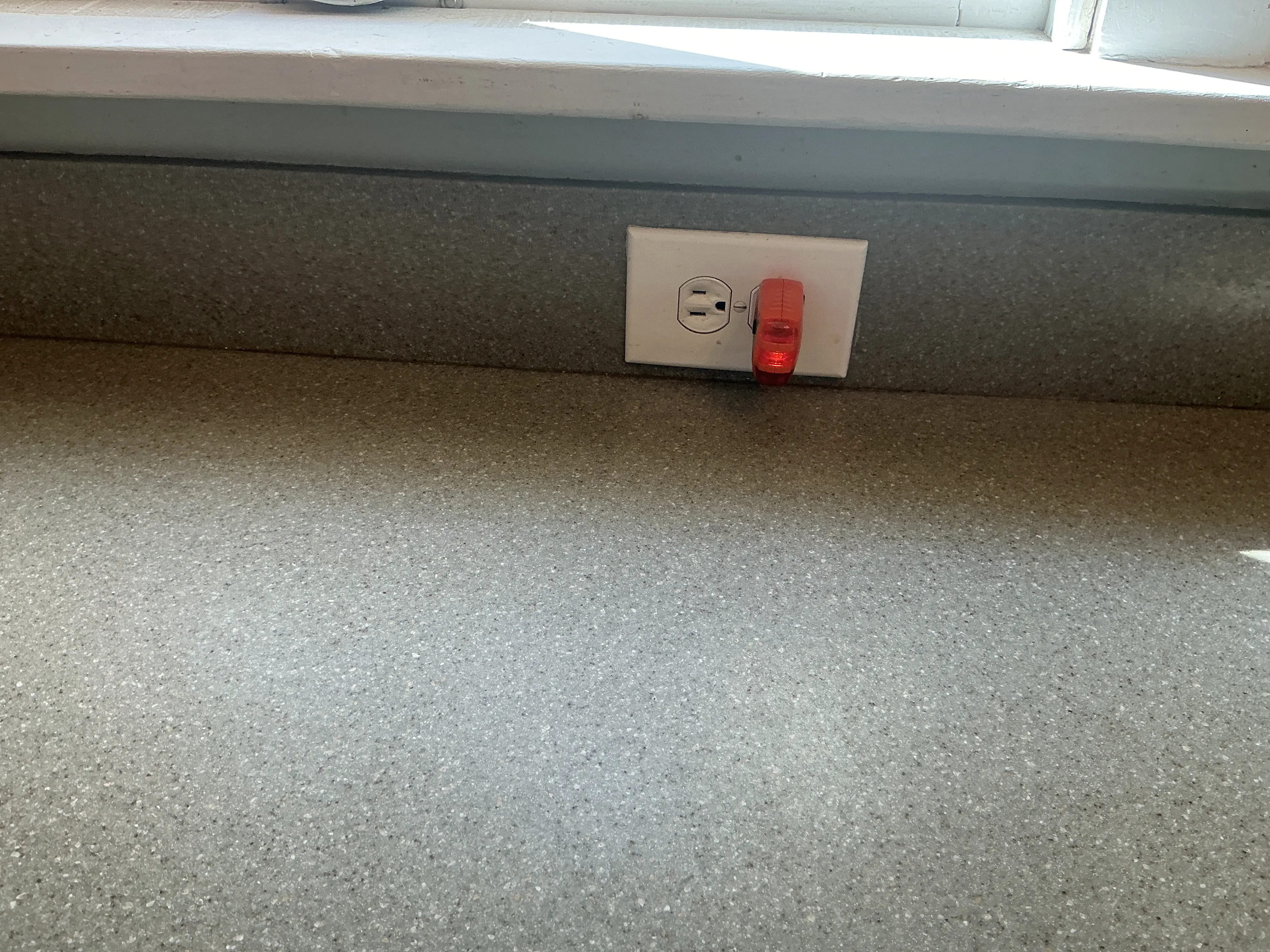 Electrical outlet tester plugged into a countertop receptacle during a home inspection 2026-07-08